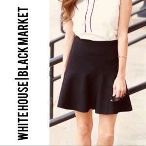 Like new White House Black Market Black Classic Flounce Skirt Size 10